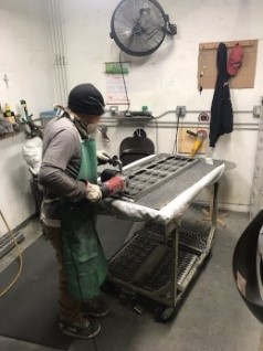 Polishing operator at bench